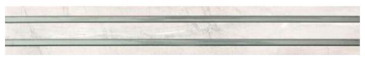 Listwa Terra White 10,5x75 z imitacją kamienia w szaro-białych odcieniach o błyszczącej powierzchni