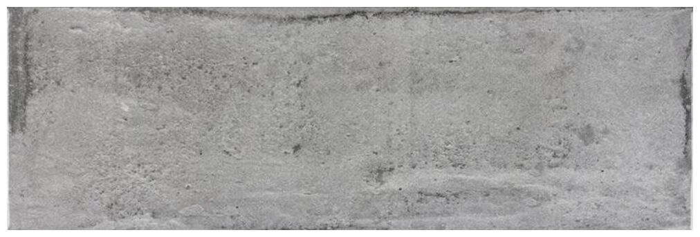 Szara glazura hiszpańska Arles Nickel 10x30 o strukturze imitującej beton z subtelnym połyskiem