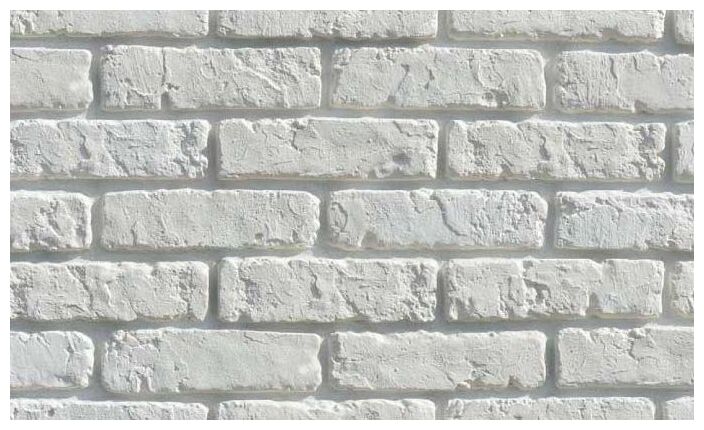 Jasny kamień dekoracyjny Retro Brick White o ceglanej fakturze i nieregularnej powierzchni